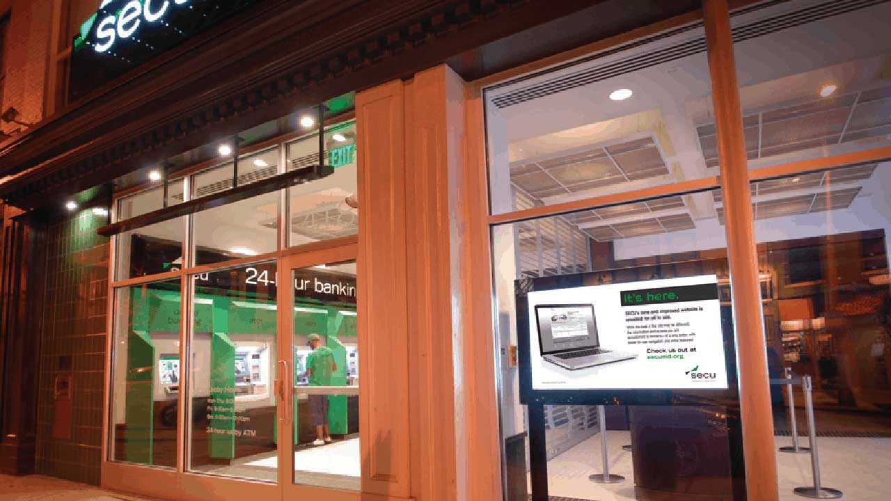credit union lobby exterior facing digital window sign